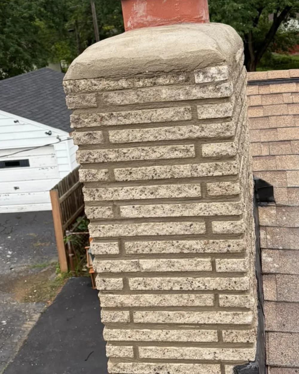 Side view of the completed chimney crown and screened cap