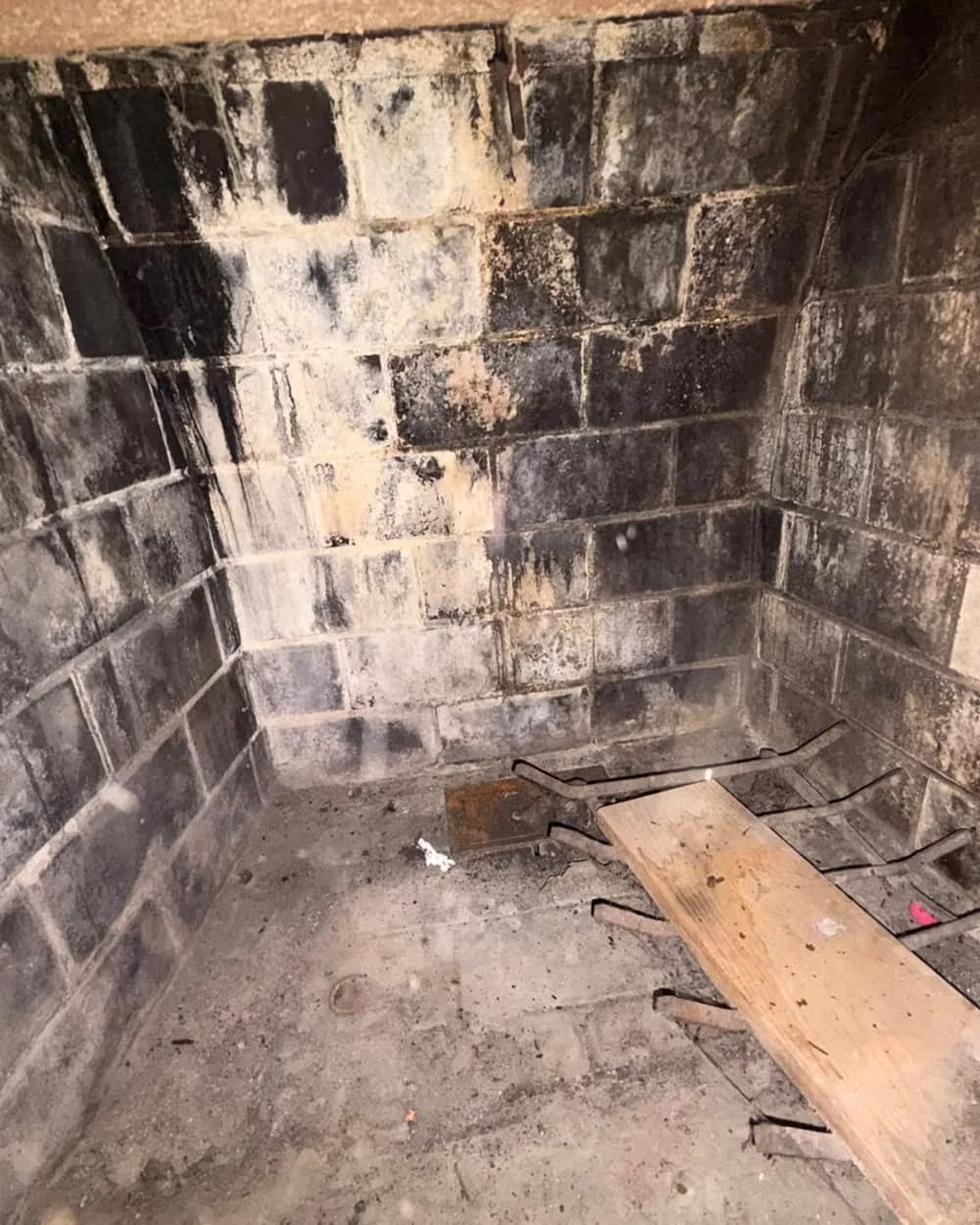 Interior of the exposed firebox while the fireplace work is in progress